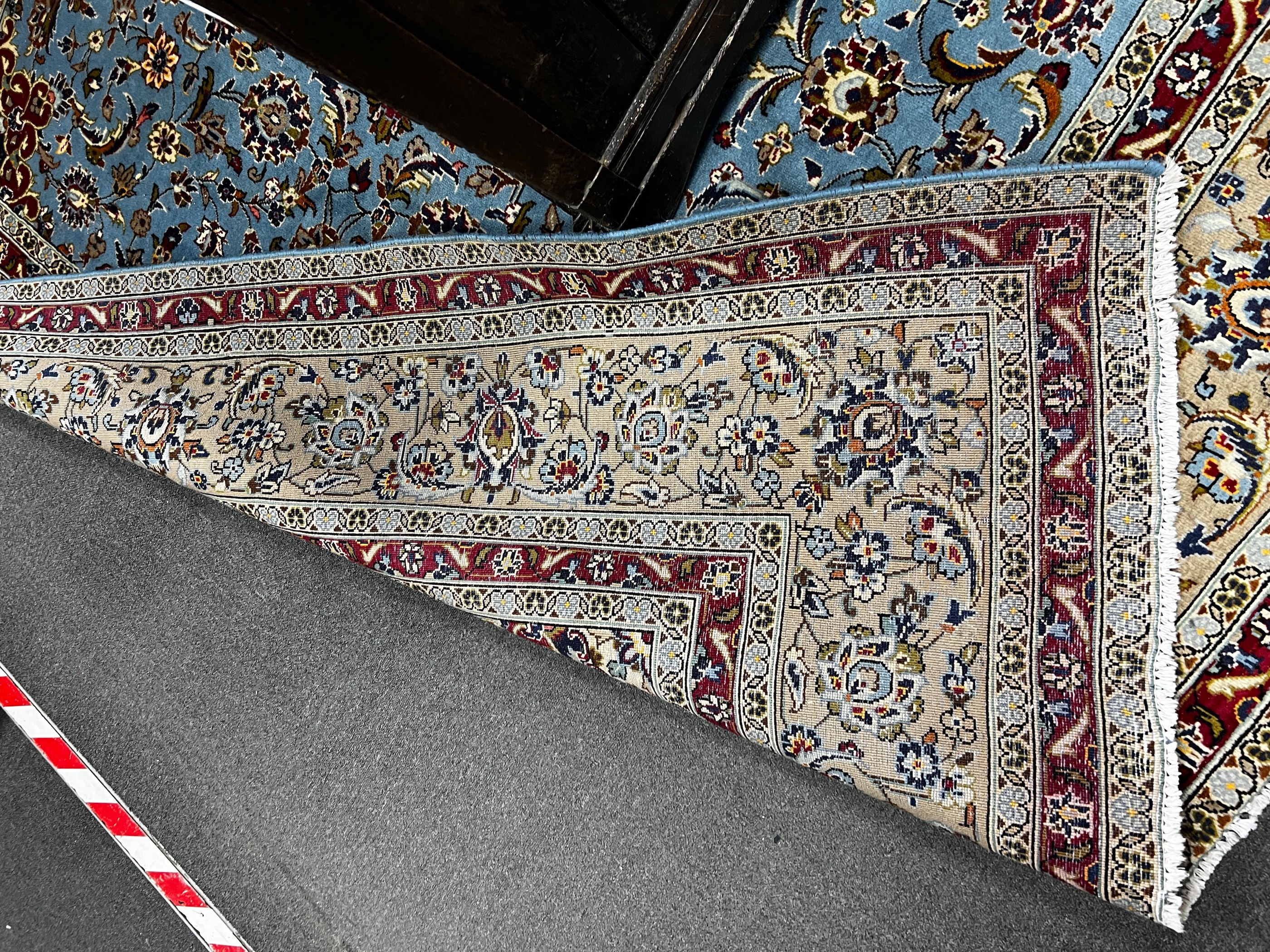 A Kashan blue ground carpet, 242 x 242cm